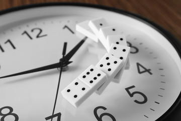 Dominoes on clock, closeup