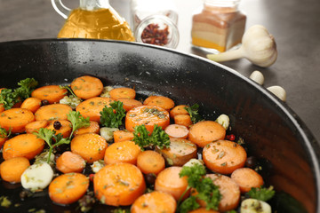 Healthy food and ingredients with sliced carrots, parsley and spices