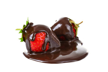 Juicy strawberries in chocolate on white background