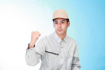 ガッツポーズの労働者