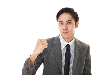ガッツポーズのビジネスマン