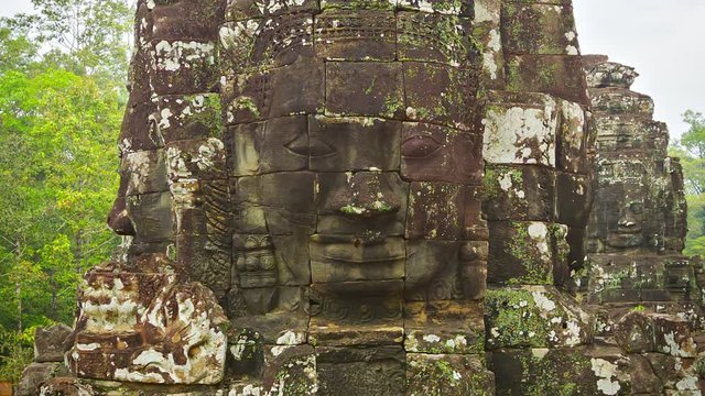 Video 1920x1080 - Stone towers of the old temple with a faces. 12th - 13th century. Cambodia, Angkor, Bayon