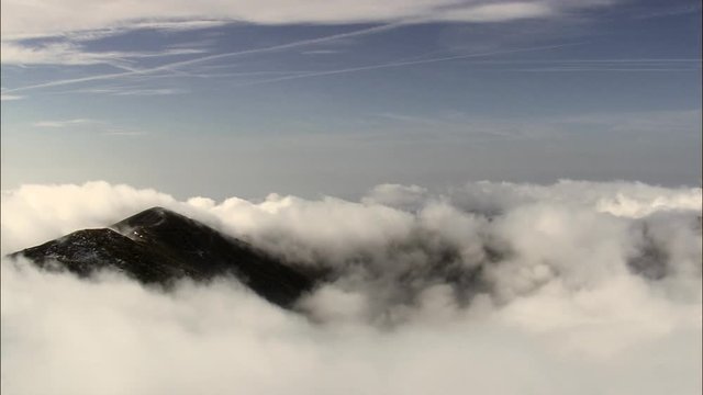 Through The Clouds To Mountain Tops