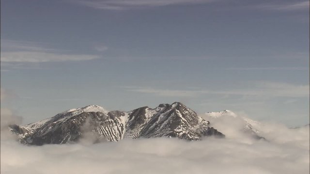 Through The Clouds To Mountain Tops