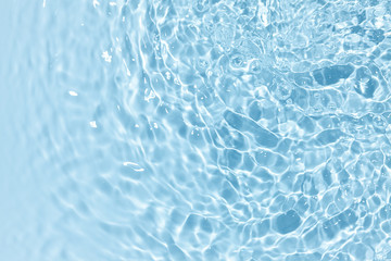 Fototapeta na wymiar Blue clear water background