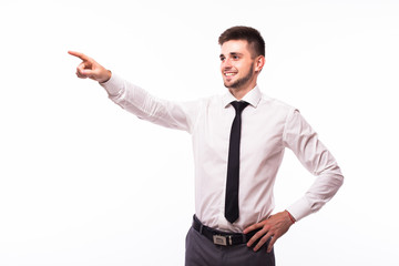Businessman with pointed copy space gesture over white background