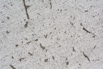 Rough chipped concrete texture closeup