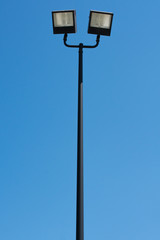 Small stadium lights on a sunny day