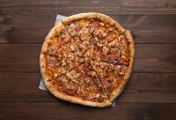 pizza on a wooden background