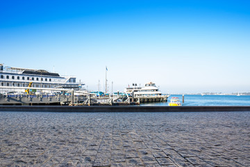 empty floor near dock with ships in san francisco