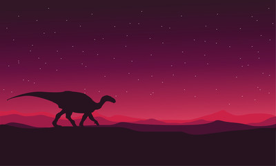 Landscape Iguanodon silhouettes vector