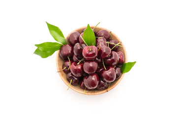 fresh cherry in wood bowl