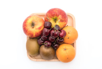 Naklejka na ściany i meble mixed fruit in wood plate