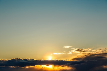 Blue sky with clouds before sunset