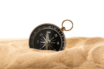 Fototapeta na wymiar Compass in sand