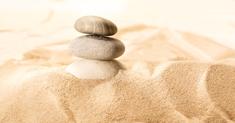 Fototapeta na wymiar Sand and sea stones in closeup