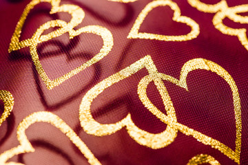 Romantic textile background with hearts