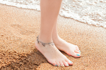 legs of a young girl and anklet ankle