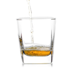 Glass of scotch whiskey  on a white background