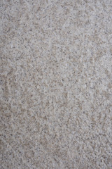 ベージュの磁器タイルのアップ