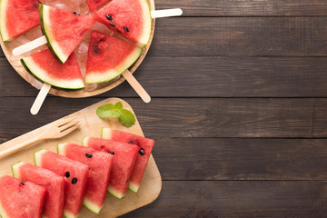 Top view healthy watermelon and watermelon ice cream on the wooden