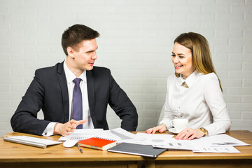 Business people working on a document while sitting in the office