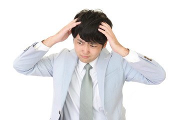 苦悩するビジネスマン