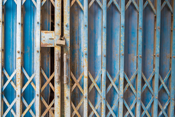 The rusty steel door with lock