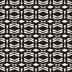 Seamless abstract  vector ethnic tribal pattern in monochrome ba