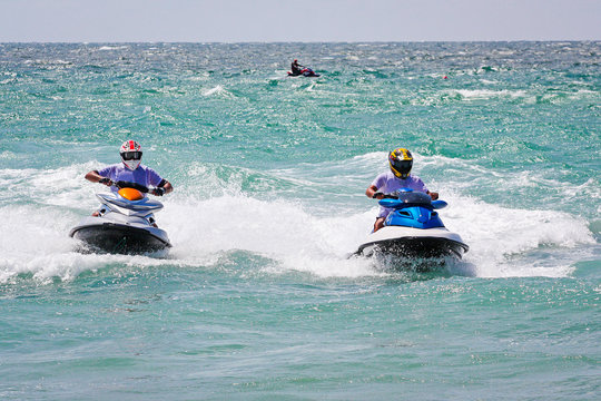 Young Man on Jet Ski. Professional jet ski rider. Jet Ski Champi