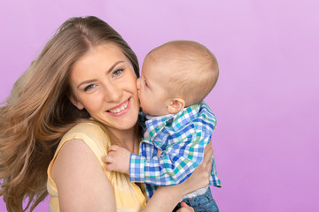 Happy young mother and her son