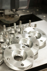 Metal mold of flanges and bolts. CNC milling/lathe industry