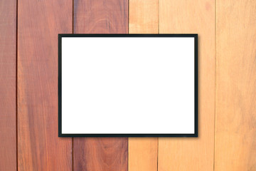 Mock up blank poster picture frame on wood wall.