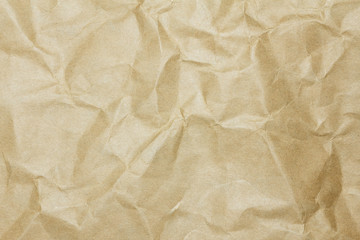 Recycled crumpled brown paper texture or paper background for design with copy space for text or image.