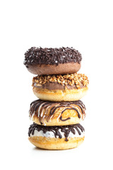 various donuts on white background