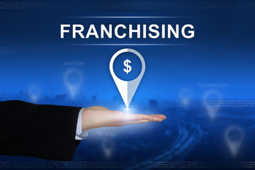 franchising button on blurred background
