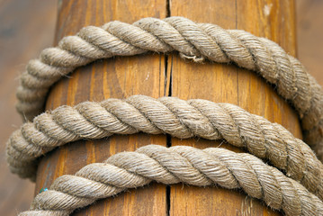The rope wound on wooden timber