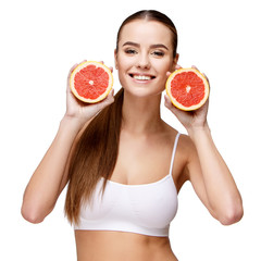 portrait of attractivesmiling woman holding grapefruit isolated on white