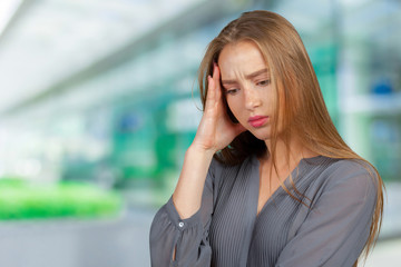 Portrait of an attractive young woman thinking deeply