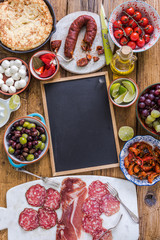 tapas selection and chalkboard