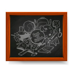 Back to school illustration, various school elements drawn in chalk on blackboard