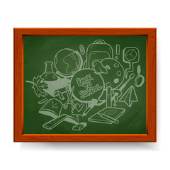 Back to school illustration, various school elements drawn in chalk on green blackboard