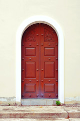 Fototapeta premium red iron door with swastika symbol at Kek Lok Si chinese temple in Penang.