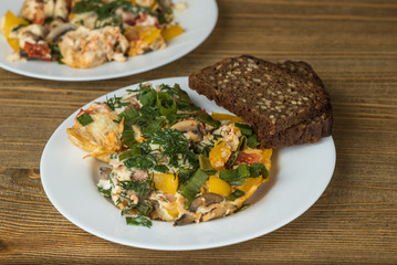 omelet eggs on a plates on wooden table