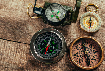 Fototapeta na wymiar Compass on a wood deck