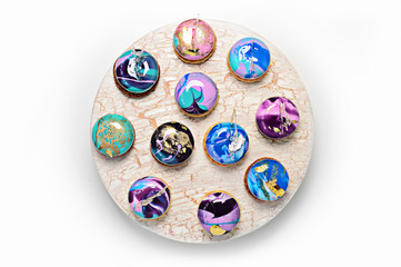 Vibrant cupcakes on white background