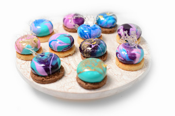 Vibrant cupcakes on white background