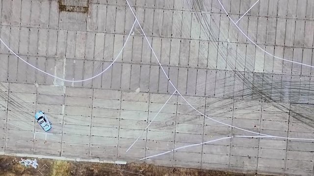 the car does drift on asphalt and burning tires