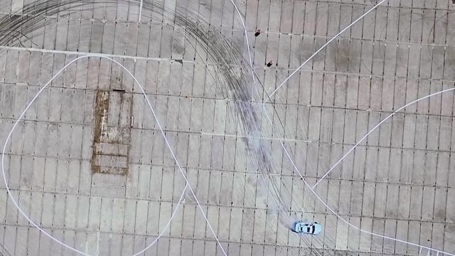 the car does drift on asphalt and burning tires