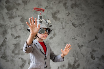 Child with toy virtual reality headset